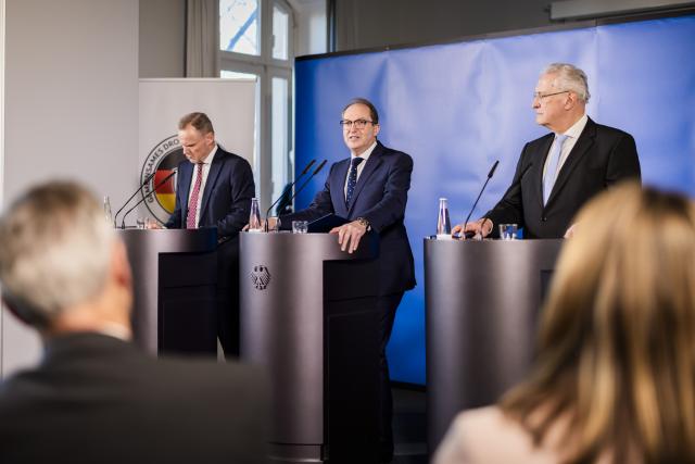 17 December 2025, Berlin: (L-R) Andy Grote, Senator of the Interior of Hamburg, Alexander Dobrindt, German Minister of the Interior, and Joachim Herrmann, Bavarian Minister of the Interior, speak at a press conference on the opening of the Joint Drone Defense Center (GDAZ) of the German federal and state governments at Federal Police Directorate 11 in Berlin. Representatives of the federal and state governments are opening a joint drone defense center in Berlin to create an up-to-date nationwide picture of the situation and coordinate defense measures. Photo: Christoph Soeder/dpa