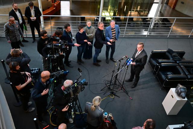 17 December 2025, Berlin: Boris Pistorius (C-R), German Minister of Defense, gives a press statement after a meeting of the Bundestag's budget committee. Photo: Sebastian Christoph Gollnow/dpa