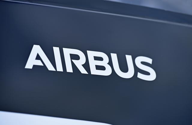 FILED - 21 October 2025, Bavaria, Wessling: The Airbus logo is displayed on an H140 helicopter. Photo: Malin Wunderlich/dpa