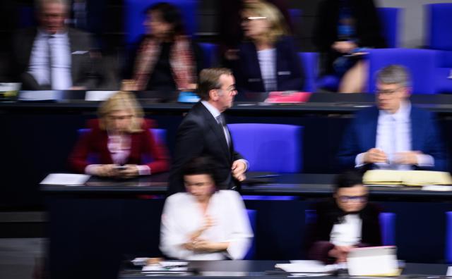 17 December 2025, Berlin: Boris Pistorius, Germany's Minister of Defence, returns to his seat during the 49th plenary session of the 21st legislative period in the German Bundestag. Photo: Bernd von Jutrczenka/dpa