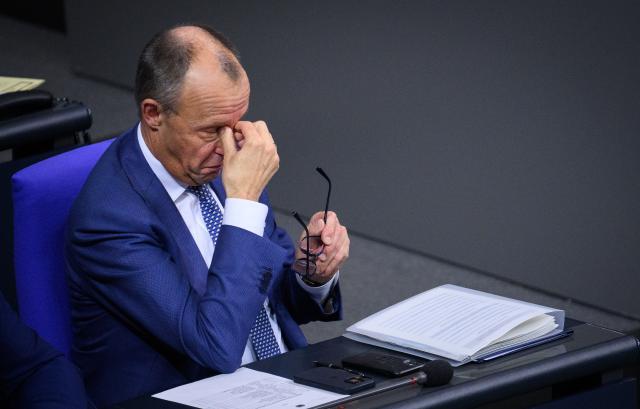 17 December 2025, Berlin: Germany's Chancellor Friedrich Merz takes part in the 49th plenary session of the 21st legislative period in the German Bundestag. Photo: Bernd von Jutrczenka/dpa