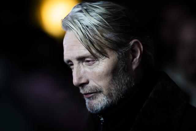 17 December 2025, Berlin: Danish actor Mads Mikkelsen, actor, poses for photos on the red carpet during "The Last Viking" premiere at the Delphi Filmpalast. Photo: Christoph Soeder/dpa