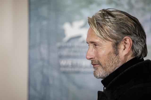 17 December 2025, Berlin: Danish actor Mads Mikkelsen, actor, poses for photos on the red carpet during "The Last Viking" premiere at the Delphi Filmpalast. Photo: Christoph Soeder/dpa