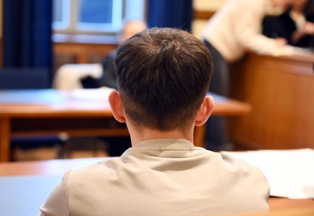 18 December 2025, Baden-Württemberg, Bruchsal: The defendant in a trial over a fatal speeding accident waits for the proceedings to begin at Bruchsal District Court. Photo: Uli Deck/dpa