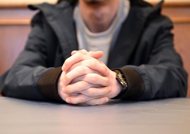 18 December 2025, Baden-Württemberg, Bruchsal: The defendant in a trial over a fatal speeding accident waits for the proceedings to begin at Bruchsal District Court. Photo: Uli Deck/dpa