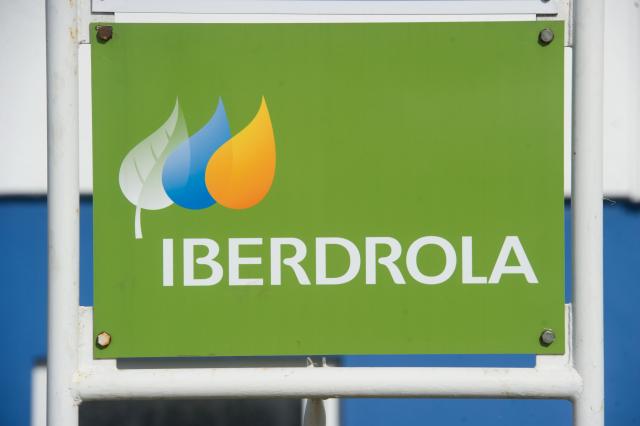 FILED - 13 March 2015, Mecklenburg-Vorpommern, Sassnitz: A sign with the logo of the Spanish energy company Iberdrola (Bilbao) is seen at the ferry port in Sassnitz. Photo: Stefan Sauer/dpa-Zentralbild/dpa