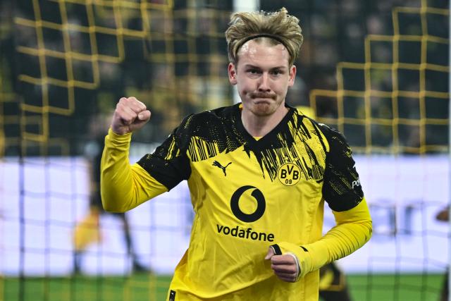 19 December 2025, North Rhine-Westphalia, Dortmund: Borussia Dortmund's Julian Brandt celebrates scoring his side's first goal during the German Bundesliga soccer match between Borussia Dortmund and Borussia Moenchengladbach at the Signal Iduna Park. Photo: Bernd Thissen/dpa