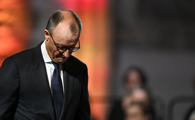 20 December 2025, Saxony-Anhalt, Magdeburg: German Chancellor Friedrich Merz reacts after his speech during a memorial service at St. John's Church in Magdeburg, one year after the attack on the Magdeburg Christmas market. On 20 December 2024, a man drove a car into a crowd, killing five women and a child and injuring more than 300 people. Photo: Hendrik Schmidt/dpa