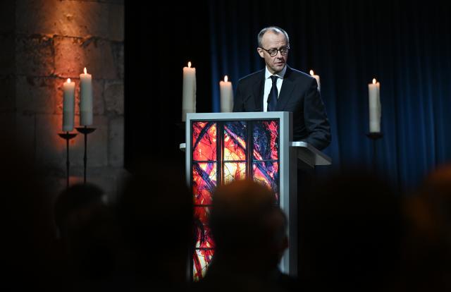 20 December 2025, Saxony-Anhalt, Magdeburg: Germany's Chancellor Friedrich Merz speaks at a memorial event at St. John's Church in Magdeburg one year after the attack on the Magdeburg Christmas market. On 20 December 2024, a man drove a car into a crowd, killing five women and a child and injuring more than 300 people. Photo: Hendrik Schmidt/dpa