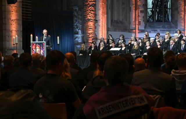 20 December 2025, Saxony-Anhalt, Magdeburg: Germany's Chancellor Friedrich Merz speaks at a memorial event at St. John's Church in Magdeburg one year after the attack on the Magdeburg Christmas market. On 20 December 2024, a man drove a car into a crowd, killing five women and a child and injuring more than 300 people. Photo: Hendrik Schmidt/dpa