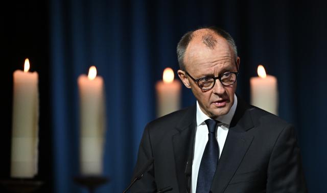 20 December 2025, Saxony-Anhalt, Magdeburg: Germany's Chancellor Friedrich Merz speaks at a memorial event at St. John's Church in Magdeburg one year after the attack on the Magdeburg Christmas market. On 20 December 2024, a man drove a car into a crowd, killing five women and a child and injuring more than 300 people. Photo: Hendrik Schmidt/dpa
