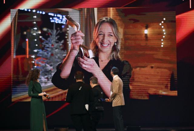 21 December 2025, Baden-Wuerttemberg, Baden-Baden: German biathlete Franziska Preuss is honored as Sportswoman of the Year 2025 during the Sportsman of the Year 2025 gala at the Kurhaus Baden-Baden. Photo: Uli Deck/dpa