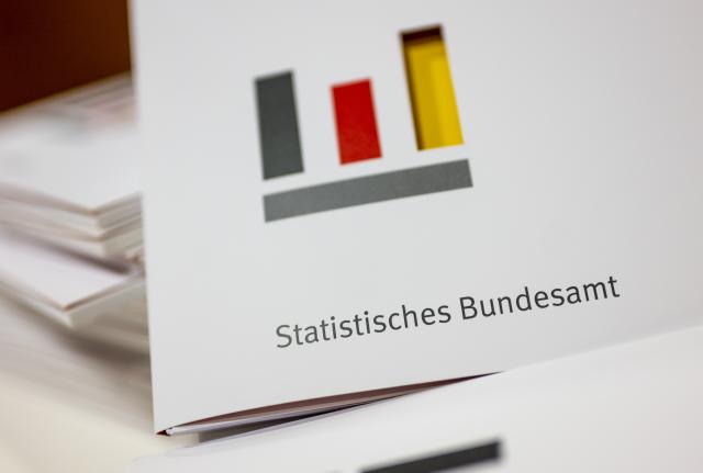 FILED - 13 January 2023, Berlin: Folders labelled Federal Statistical Office and the office's logo lie on a table during a press conference. Photo: Monika Skolimowska/dpa