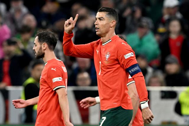 FILED - 04 June 2025, Bavaria, Munich: Portugal's Christiano Ronaldo (F) celebrates scoring his side's second goal during the UEFA Nations League semi final soccer match between Germany and Portugal at Allianz Arena. Photo: Federico Gambarini/dpa