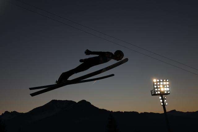 28 December 2025, Bavaria, Oberstdorf: Germany's Karl Geiger is in action during the men's large hill qualification at the Four Hills Tournament Ski Jumping World Cup. Photo: Daniel Karmann/dpa