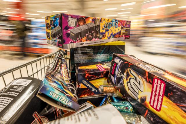29 December 2025, Brandenburg, Cottbus: A shopping cart filled with fireworks is pushed through a supermarket. The sale of New Year's Eve fireworks begins today in Germany. Photo: Frank Hammerschmidt/dpa
