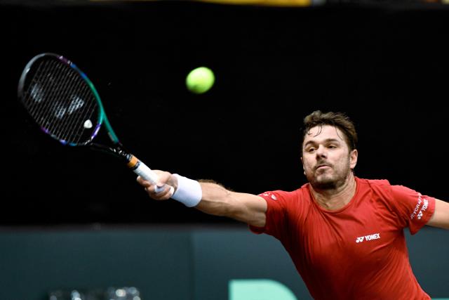 FILED - 03 February 2023, Rhineland-Palatinate, Trier: Switzerland's Stan Wawrinka in action against Germany's Alexander Zverev during their Qualifing 1st round match between Germany and Switzerland at the 2023 Davis Cup. Photo: Harald Tittel/dpa