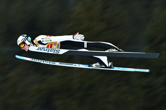29 December 2025, Bavaria, Oberstdorf: Slovenia's Domen Prevc jumps during the men's trial round of the large hill event at the Four Hills Tournament World Cup ski jumping competition. Photo: Daniel Karmann/dpa