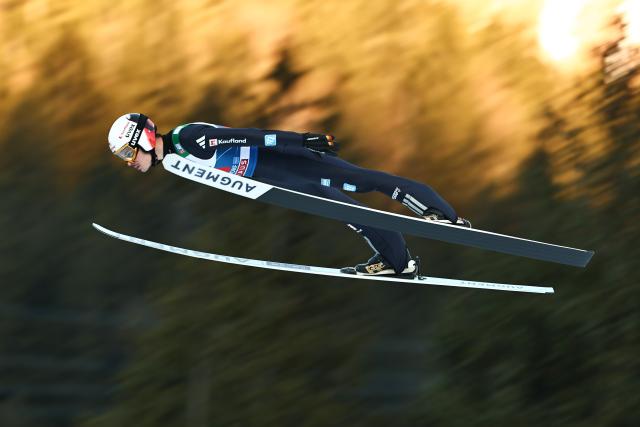29 December 2025, Bavaria, Oberstdorf: Germany's Philipp Raimund jumps during the men's trial round of the large hill event at the Four Hills Tournament World Cup ski jumping competition. Photo: Daniel Karmann/dpa