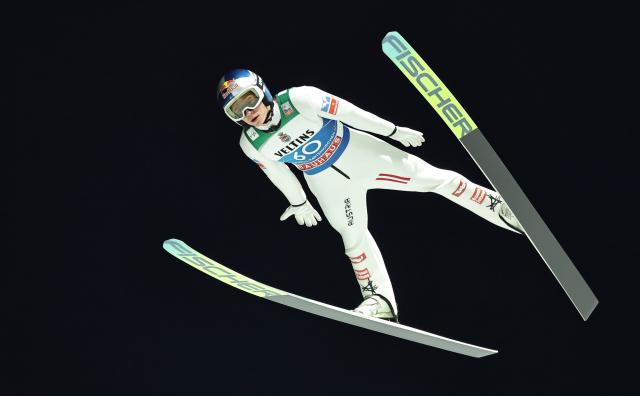 31 December 2025, Bavaria, Garmisch-Partenkirchen: Austria's Stephan Embacher competes in the men's large hill qualification at the Four Hills Tournament World Cup ski jumping event. Photo: Daniel Karmann/dpa