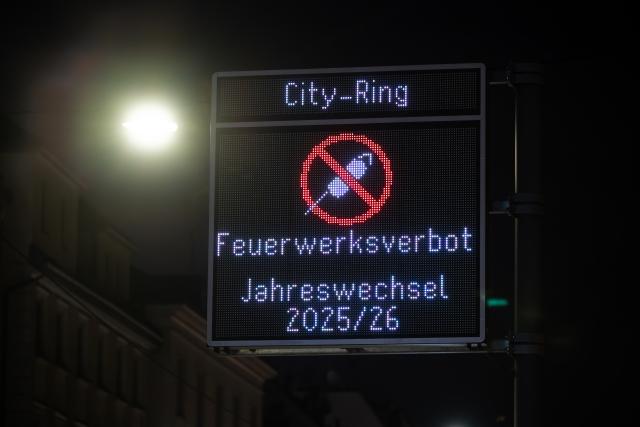 31 December 2025, Baden-Württemberg, Stuttgart: A display board informs the public about the New Year's Eve fireworks ban in the city center. Photo: Silas Stein/dpa