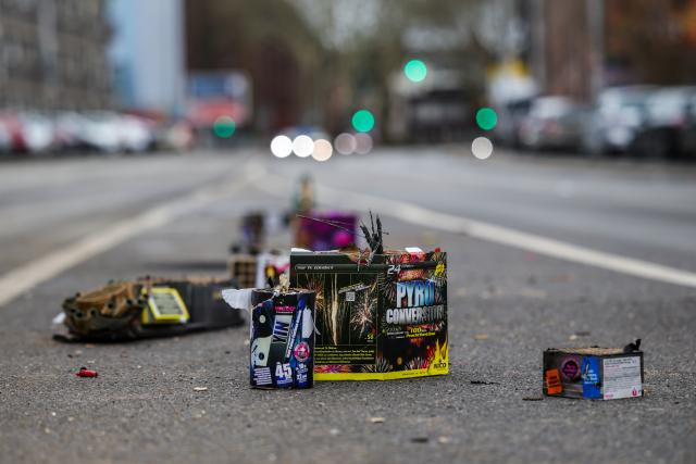 01 January 2026, North Rhine-Westphalia, Duisburg: The burnt remains of New Year's Eve firecrackers and rockets lie on the roadside. Photo: Christoph Reichwein/dpa