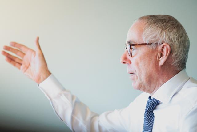 FILED - 12 December 2025, Berlin: Peter Adrian, President of the German Chamber of Industry and Commerce (DIHK), speaks in an interview with the German Press Agency. Photo: Carsten Koall/dpa