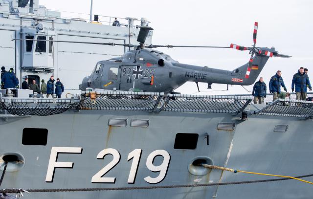 06 January 2026, Lower Saxony, Wilhelmshaven: A Sea Lynx 88A helicopter is about to set sail for a deployment lasting several months on board the frigate "Sachsen" (F 219) in the harbor at the naval base. The naval vessel will be part of the so-called Standing NATO Maritime Group 1, a NATO maritime task force, operating in the North and Baltic Seas as well as in the Atlantic. Photo: Hauke-Christian Dittrich/dpa