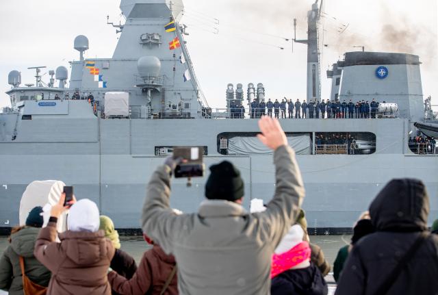 06 January 2026, Lower Saxony, Wilhelmshaven: Members of the crew wave as the frigate "Sachsen" (F 219) leaves the port at the naval base for a deployment lasting several months. The naval vessel will be part of the so-called Standing Nato Maritime Group 1, a Nato maritime task force, operating in the North Sea, Baltic Sea and Atlantic. Photo: Hauke-Christian Dittrich/dpa
