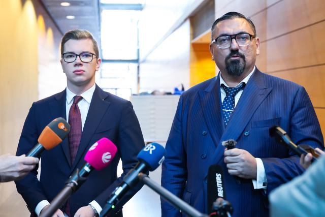 01 July 2026, Bavaria, Würzburg: AfD MP Daniel Halemba (l) gives a statement with his defense lawyer Dubravko Mandic. Halemba is facing charges including incitement of the people. Photo: Daniel Löb/dpa