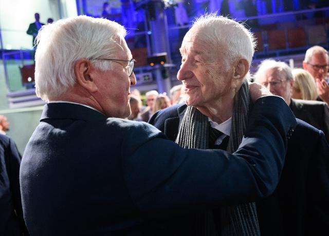07 January 2026, Berlin: German President Frank-Walter Steinmeier (L) welcomes actor and painter Armin Mueller-Stahl to the Koerber Foundation symposium entitled "Democracy as a Mission" on the occasion of Federal President Steinmeier's 70th birthday at the Academy of Arts. Photo: Bernd von Jutrczenka/dpa