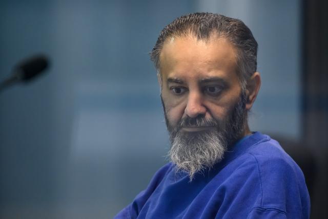 08 January 2026, Saxony-Anhalt, Magdeburg: Taleb al-Abdulmohsen sits in a glass box in the courtroom of the temporary court building at Magdeburg District Court. The public prosecutor's office is accusing the man from Saudi Arabia of 338 counts of attempted murder. Photo: Klaus-Dietmar Gabbert/dpa