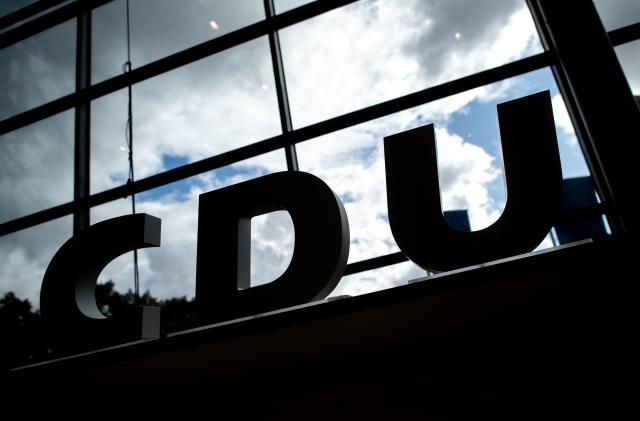 FILED - 23 August 2025, Lower Saxony, Osnabrueck: A CDU logo stands in front of a window at the Lower Saxony CDU state party conference. Photo: Hauke-Christian Dittrich/dpa