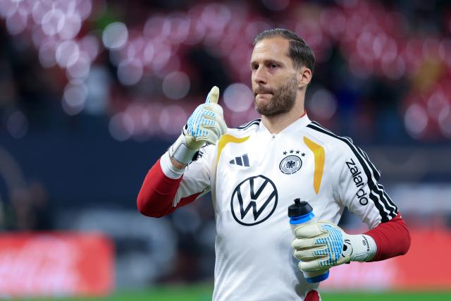 FILED - 17 November 2025, Saxony, Leipzig: Germany goalkeeper Oliver Baumann warms up ahead of the FIFA World Cup European qualifying soccer match between Germany and Slovakia at Red Bull Arena. Photo: Jan Woitas/dpa