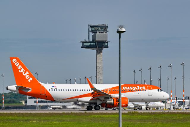 FILED - 08 May 2024, Brandenburg, Schoenefeld: An Easyjet aircraft taxis at Berlin Brandenburg Airport BER. EasyJet is adding new wingtip devices to some of its oldest aircraft to boost their fuel efficiency. Photo: Patrick Pleul/dpa