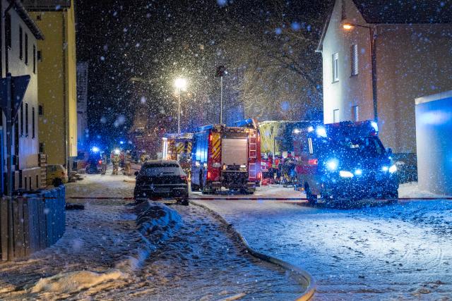 08 January 2026, Baden-Württemberg, Albstadt: Firefighters and rescue workers are on the scene of an explosion. An explosion in a residential building caused the building to collapse. A family is missing after a residential building collapsed in south-western Germany following a gas explosion, police said on Thursday. Photo: Jannik Nölke/dpa
