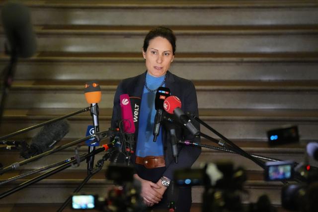 09 January 2026, Hamburg: Mia-Christine Sperling-Karstens, senior public prosecutor and spokesperson for the Hamburg public prosecutor's office, speaks to media representatives at the Higher Regional Court before the start of the non-public "White Tiger" trial. The suspected paedophile "White Tiger", who became known under his forum name, has to answer to the Hamburg Regional Court. Photo: Marcus Brandt/dpa