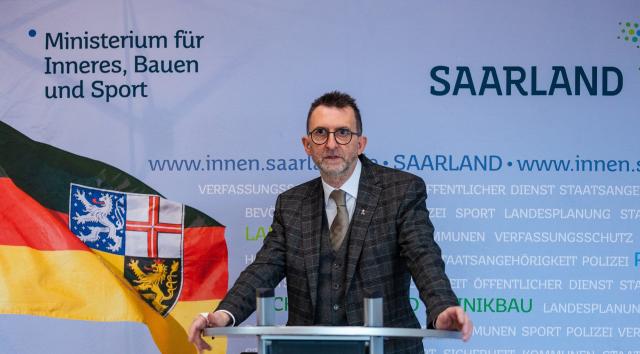 09 January 2026, Saarland, Saarbruecken: Saarland's Minister of the Interior Reinhold Jost speaks at the presentation of the draft "Raeume des Gedenkens" (Spaces of Remembrance) for a memorial to police officers who died in the line of duty in Saarland. Photo: Laszlo Pinter/dpa