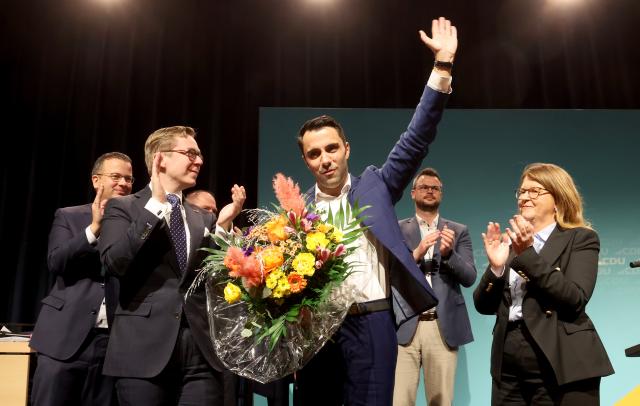 10 January 2026, Mecklenburg-Western Pomerania, Rostock: Sebastian Ehlers (l-r), CDU member of the state parliament, Philipp Amthor, CDU member of the Bundestag, Daniel Peters, CDU party and parliamentary group leader in Mecklenburg-Vorpommern, Tino Schomann, CDU district administrator in the district of Nordwestmecklenburg, and Katy Hoffmeister, member of the Mecklenburg-Vorpommern state parliament, at the state representatives' meeting after the announcement of the election results for first place on the state list for the state elections in around eight months' time. Peters received 97.3 percent of the delegates' votes. Photo: Bernd Wüstneck/dpa