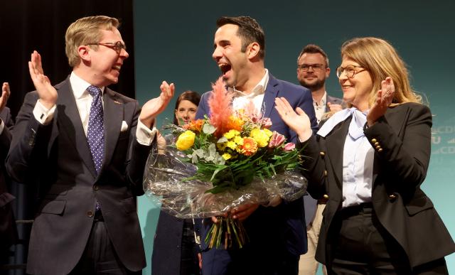 10 January 2026, Mecklenburg-Western Pomerania, Rostock: Philipp Amthor (L-R), member of the Bundestag, Daniel Peters, CDU party and parliamentary group leader in Mecklenburg-Vorpommern, and Katy Hoffmeister, CDU member of the state parliament, at the state representatives' meeting after the announcement of the election results for first place on the state list for the state elections in around eight months' time. Peters received 97.3 percent of the delegates' votes. Photo: Bernd Wüstneck/dpa