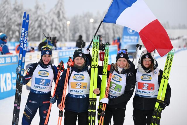 10 January 2026, Thuringia, Oberhof: (L-R) France's Julia Simon, Justine Braisaz-Bouchet, Oceane Michelon, and Julia Simon react after the women's 4 x 6 km relay event of the IBU Biathlon World Cup in Oberhof. Photo: Hendrik Schmidt/dpa
