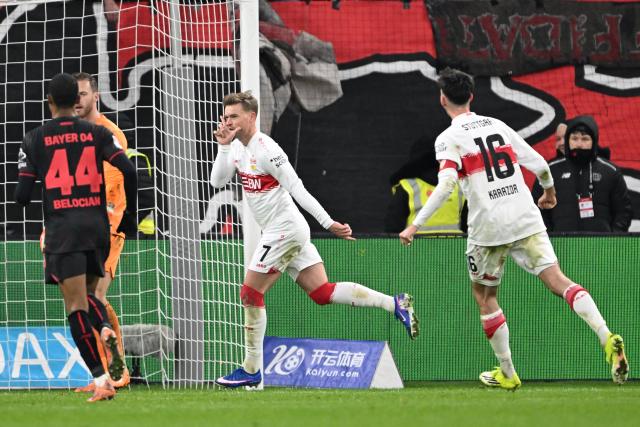 10 January 2026, North Rhine-Westphalia, Leverkusen: Stuttgart's Maximilian Mittelstaedt (C) celebrates scoring his side's second goal during the German Bundesliga soccer match between Bayer Leverkusen and VfB Stuttgart at BayArena. Photo: Federico Gambarini/dpa - IMPORTANT NOTICE: DFL and DFB regulations prohibit any use of photographs as image sequences and/or quasi-video.