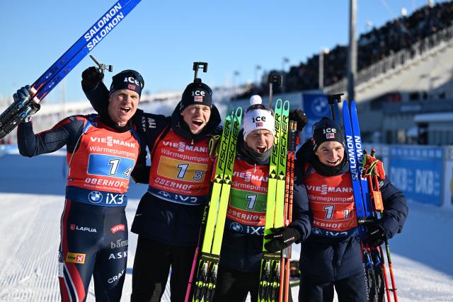 11 January 2026, Thuringia, Oberhof: Norway's team of (L-R) Vetle Sjaastad Christiansen, Martin Uldal, Johannes Dale-Skjevdal, and Isak Leknes, celebrate their first place in the finish area of the Men's Relay 4 x 7.5 km competition of the IBU Biathlon World Cup in Oberhof. Photo: Hendrik Schmidt/dpa