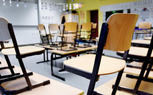 FILED - 12 March 2020, North Rhine-Westphalia, Gelsenkirchen: Chairs are standing on tables in an empty classroom at a primary school in Gelsenkirchen. The government of the German state of North Rhine-Westphalia announced on Sunday that distance learning will be implemented throughout the state on Monday due to the risk of severe icy roads. Photo: Caroline SeidSeidel-Dißmannel/dpa
