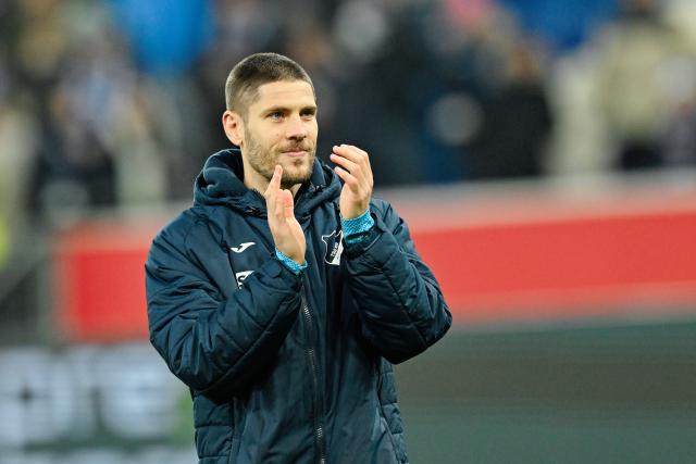 FILED - 13 December 2025, Baden-Württemberg, Sinsheim: Hoffenheim's Andrej Kramaric thanks the fans after the German Bundesliga soccer match between TSG 1899 Hoffenheim and Hamburger SV at PreZero Arena. Croatia international Andrej Kramaric regrets that a move from Hoffenheim to Bayern Munich never came to fruition. Photo: Uwe Anspach/dpa - IMPORTANT NOTE: In accordance with the regulations of the DFL German Football League and the DFB German Football Association, it is prohibited to utilize or have utilized photographs taken in the stadium and/or of the match in the form of sequential images and/or video-like photo series.