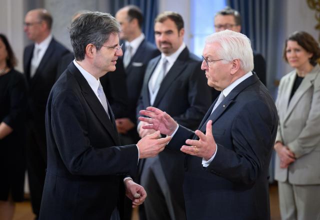 13 January 2026, Berlin: Germany President Frank-Walter Steinmeier welcomes Fran·ois Marie Delattre (l), Ambassador of France to Germany, at the Federal President's New Year's reception for the diplomatic corps at Bellevue Palace. Photo: Bernd von Jutrczenka/dpa