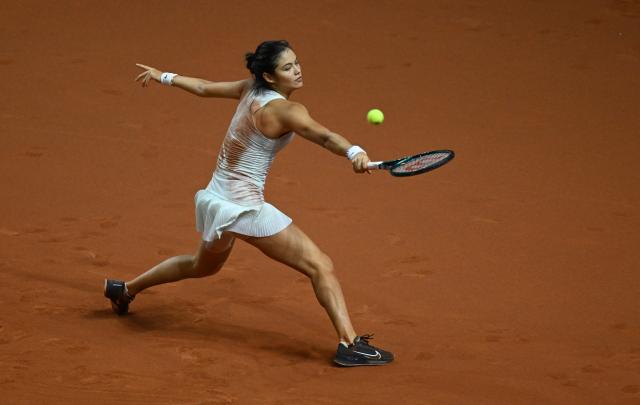 FILED - 19 April 2024, Baden-Wuerttemberg, Stuttgart: British tennis player Emma Raducanu in action against Polish Iga Swiatek during their Women's singles quarterfinal tennis match at the Stuttgart Open Tennis tournament. Emma Raducanu claimed her first victory of the new season after fighting back to see off Camila Osorio at the Hobart International. Photo: Marijan Murat/dpa