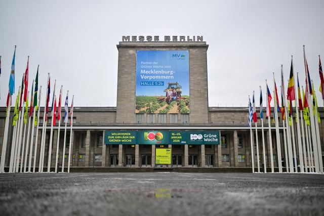 14 January 2026, Berlin: '100 years' is displayed on a banner at Messe Berlin ahead of the 90th International Green Week, running from January 16 to 25. The world's largest trade fair for food, agriculture, and horticulture is celebrating its 100th anniversary. Photo: Sebastian Christoph Gollnow/dpa