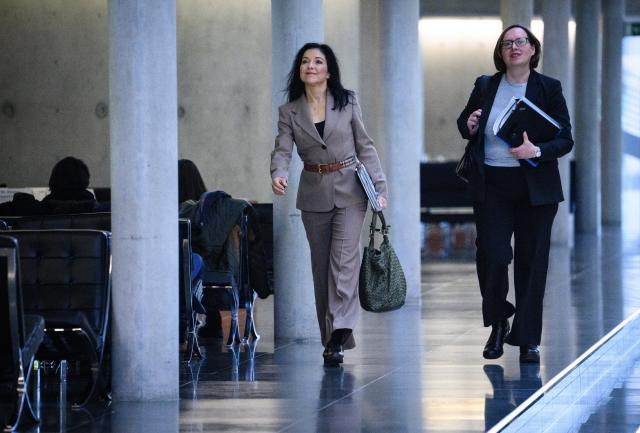 14 January 2026, Berlin: Katherina Reiche (L), Germany's Minister for Economic Affairs and Energy, arrives at the 22nd meeting of the Bundestag Committee on Economic Affairs and Energy. According to the agenda, the session will include a discussion with Minister Reiche regarding allegations of possible conflicts of interest. Photo: Bernd von Jutrczenka/dpa