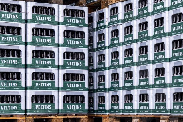 FILED - 16 January 2023, North Rhine-Westphalia, Meschede: Empty Veltins bottles are stacked on the company premises. Photo: David Inderlied/dpa
